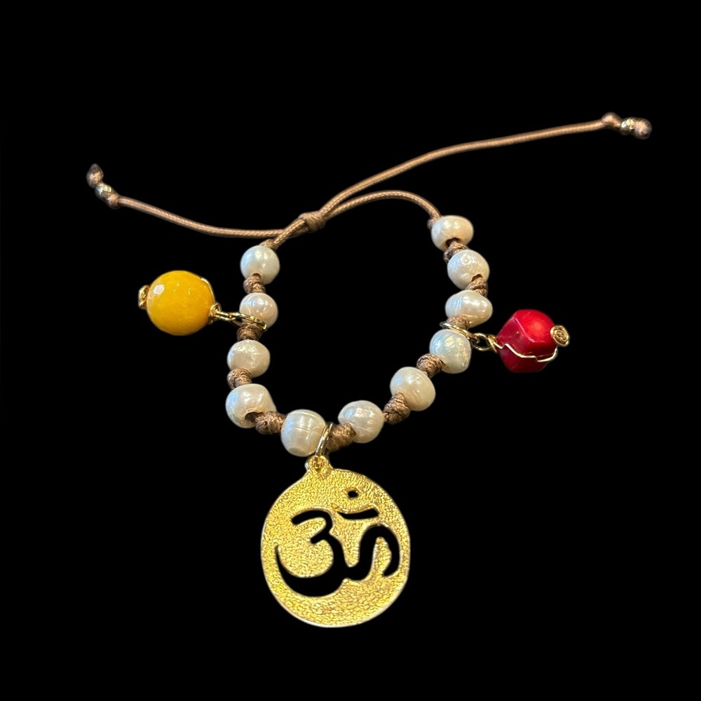 OM Charm combined with freshwater pearls and stones on adjustable cord. JB4